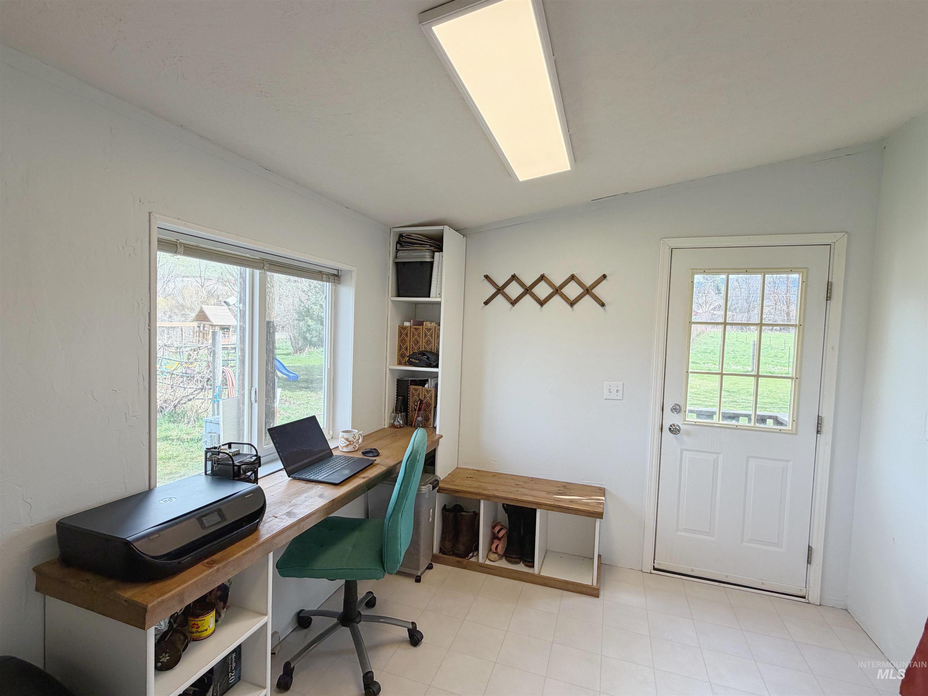 2605 West Frk Road Council, ID 83612 - Photo 21 of 34 Office space featuring healthy amount of natural light and vaulted ceiling