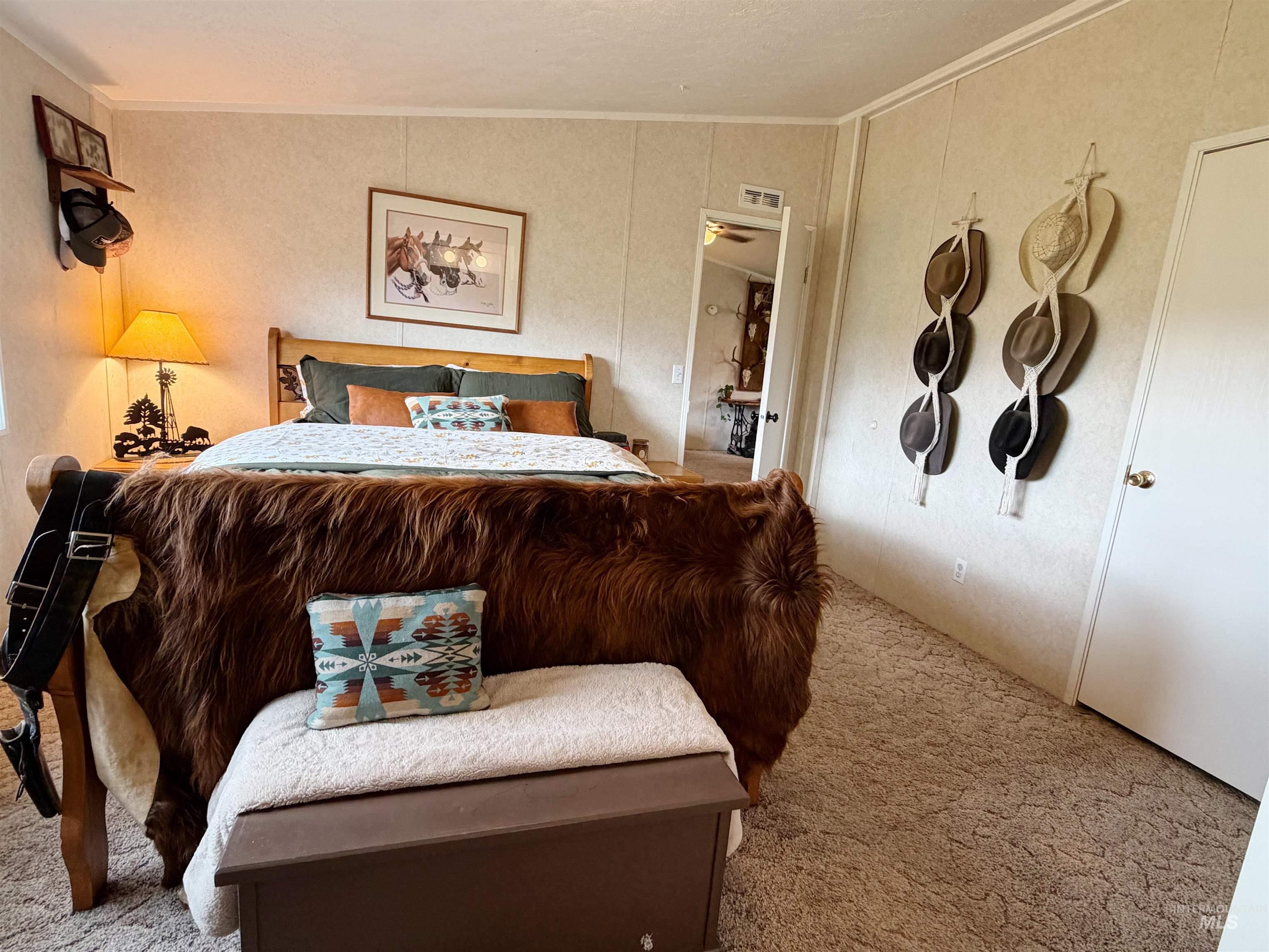 2605 West Frk Road Council, ID 83612 - Photo 24 of 34 Bedroom with carpet flooring and lofted ceiling