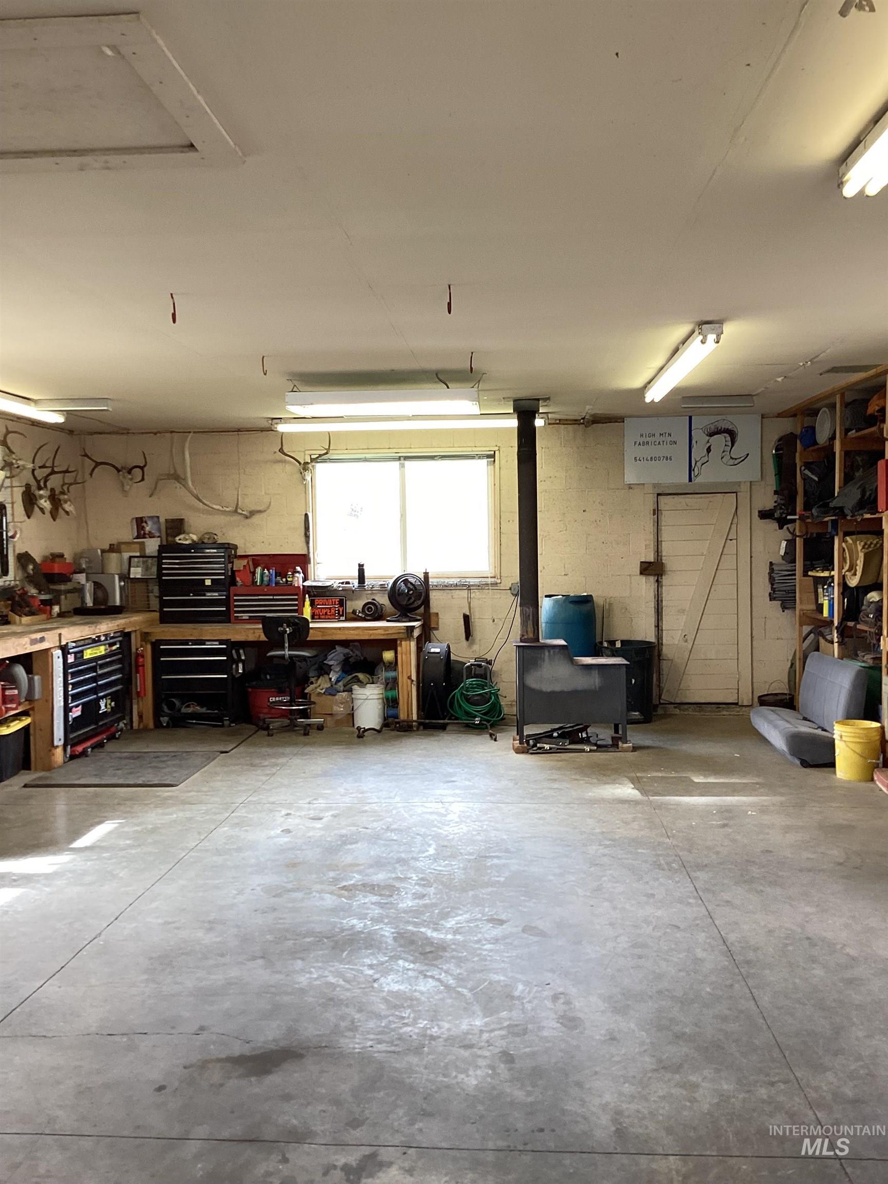 2605 West Frk Road Council, ID 83612 - Photo 31 of 34 Garage featuring a workshop area