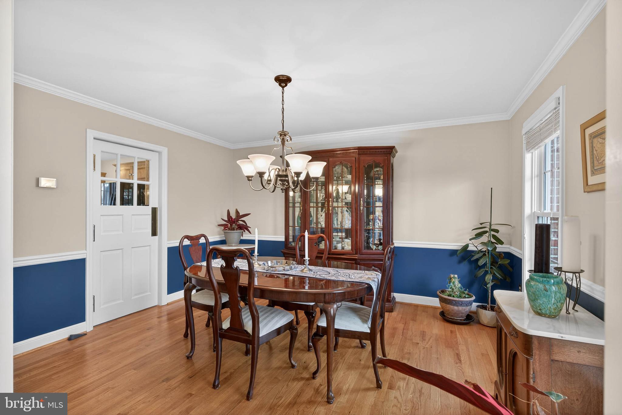 35 Old Post Lane Lititz, PA 17543 - Photo 11 of 61 a view of a dining room and livingroom with furniture wooden floor a chandelier