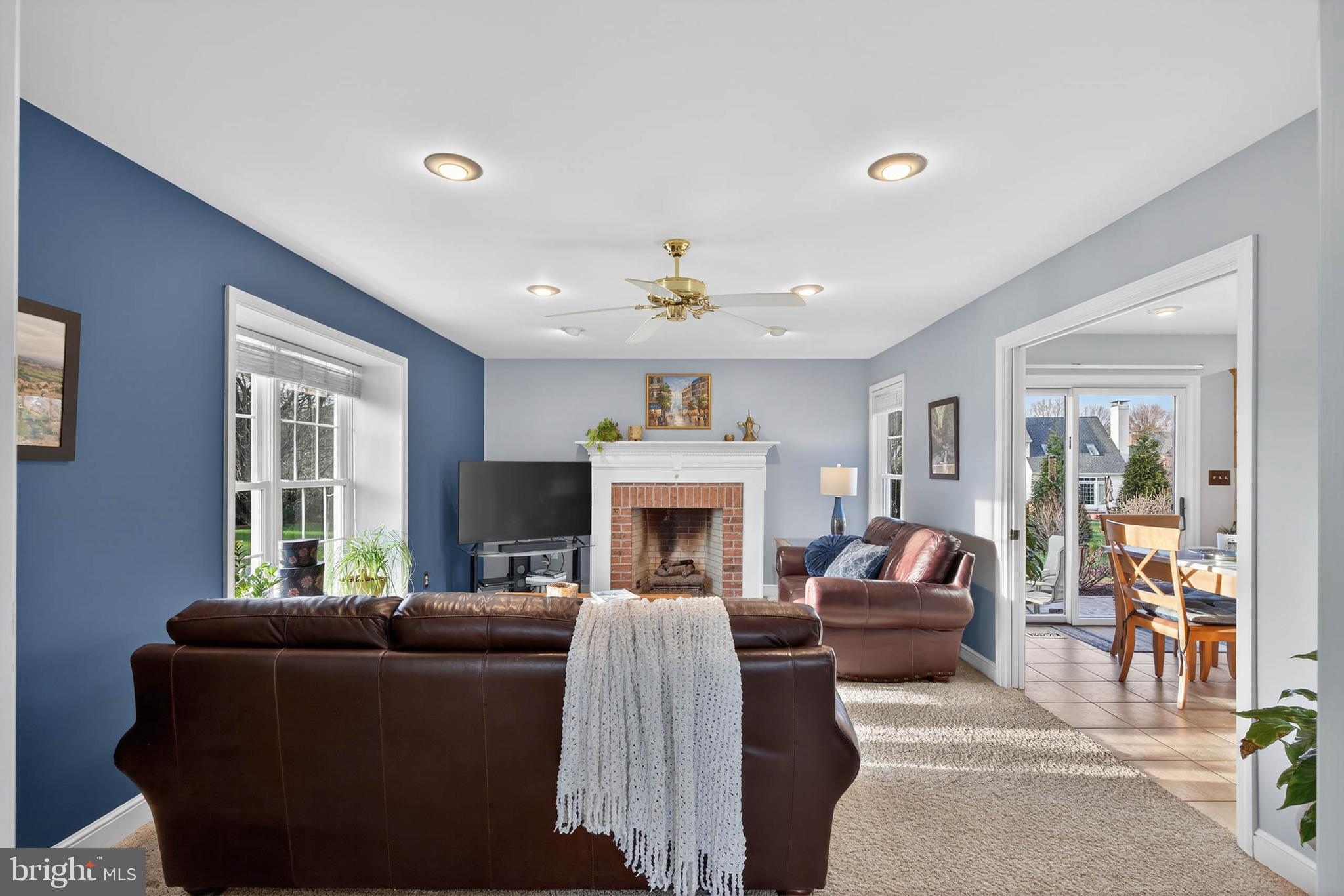 35 Old Post Lane Lititz, PA 17543 - Photo 15 of 61 a living room with furniture a fireplace and a flat screen tv