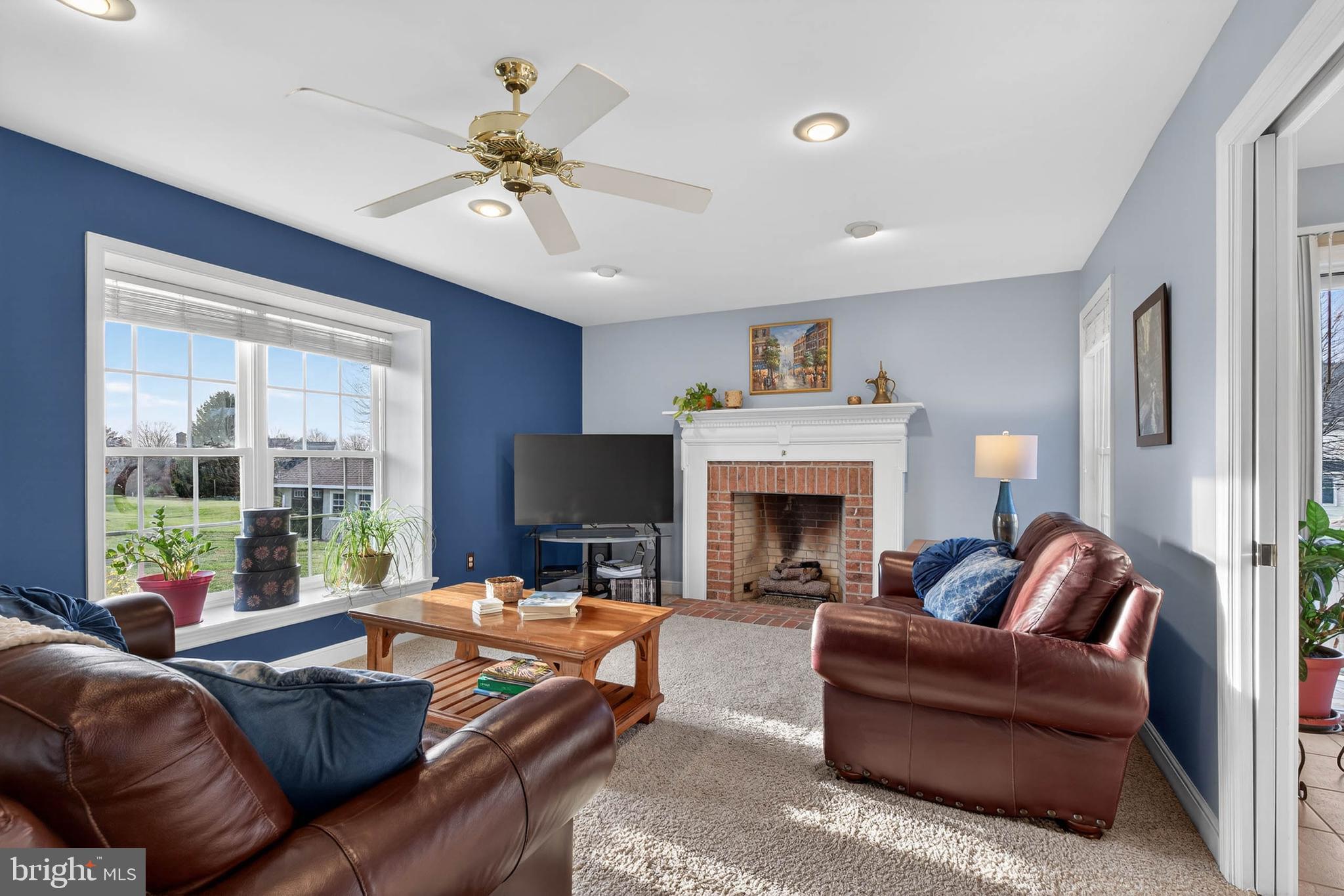 35 Old Post Lane Lititz, PA 17543 - Photo 3 of 61 a living room with furniture a fireplace and a large window