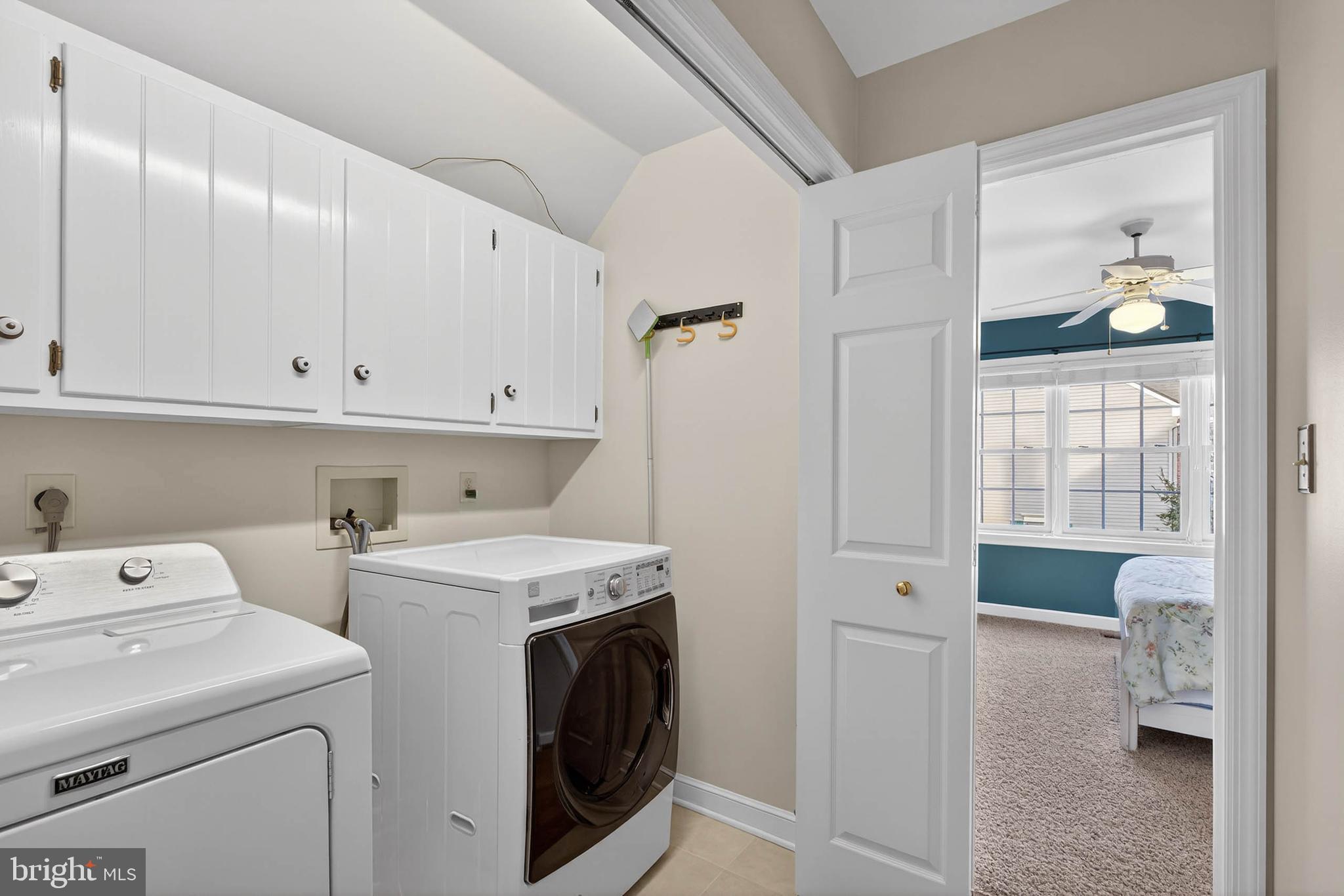35 Old Post Lane Lititz, PA 17543 - Photo 43 of 61 a view of washer and dryer with bathroom in the background