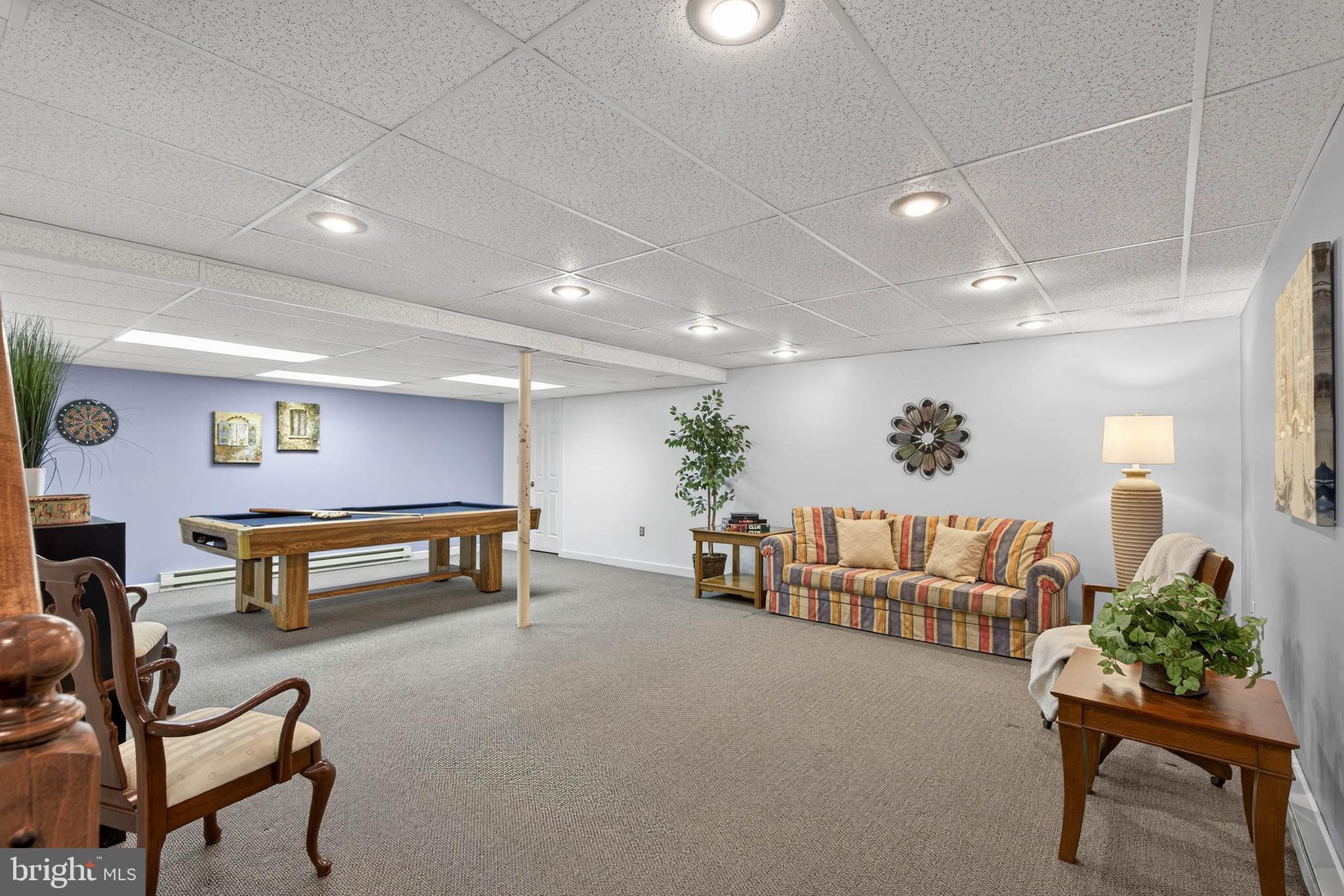 35 Old Post Lane Lititz, PA 17543 - Photo 5 of 61 a living room with furniture and a potted plant