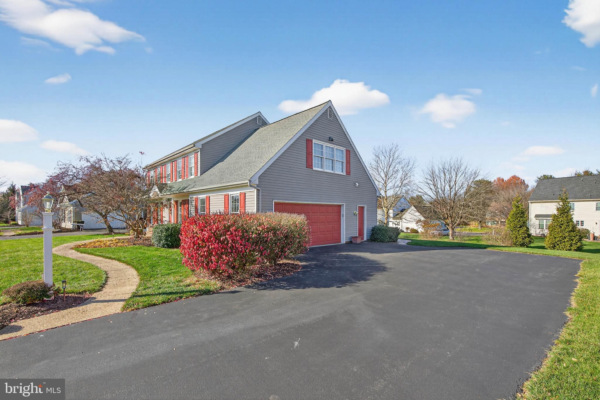35 Old Post Lane Lititz, PA 17543 - Photo 53 of 61 a front view of a house with a yard and garage