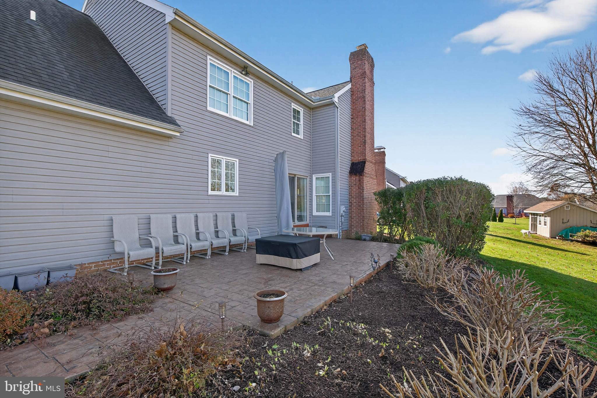 35 Old Post Lane Lititz, PA 17543 - Photo 55 of 61 a wooden bench sitting in front of a house
