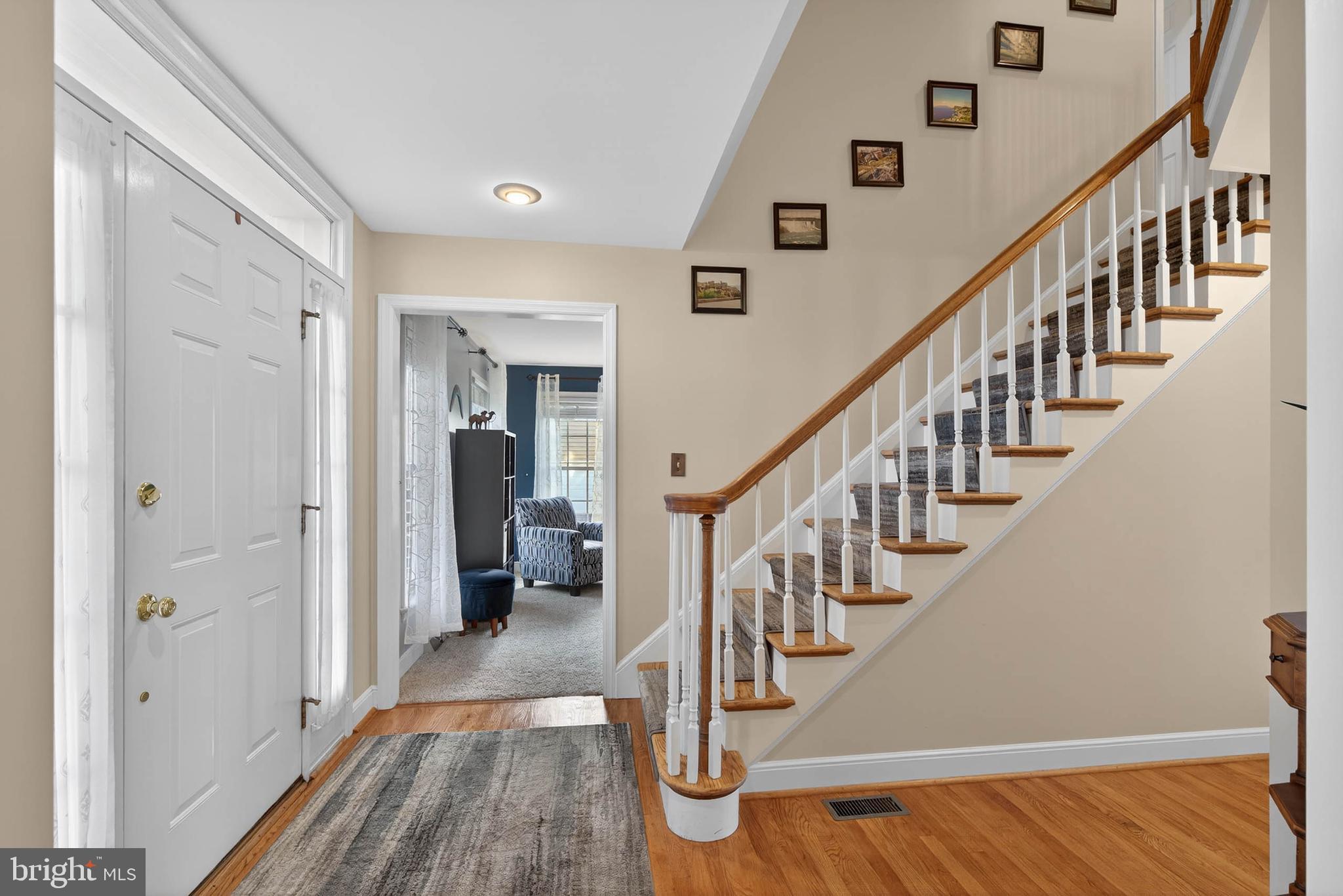 35 Old Post Lane Lititz, PA 17543 - Photo 7 of 61 a view of entryway and hall with wooden floor