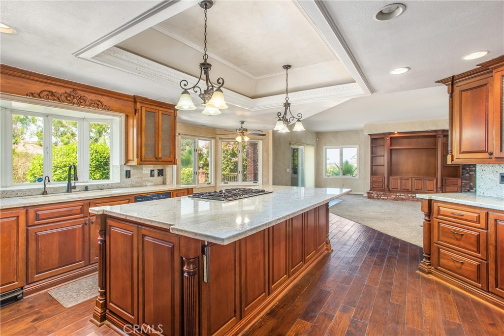 6966 Ranch View Road Riverside, CA 92506 - Photo 13 of 73 a kitchen with stainless steel appliances granite countertop a sink a stove and a refrigerator