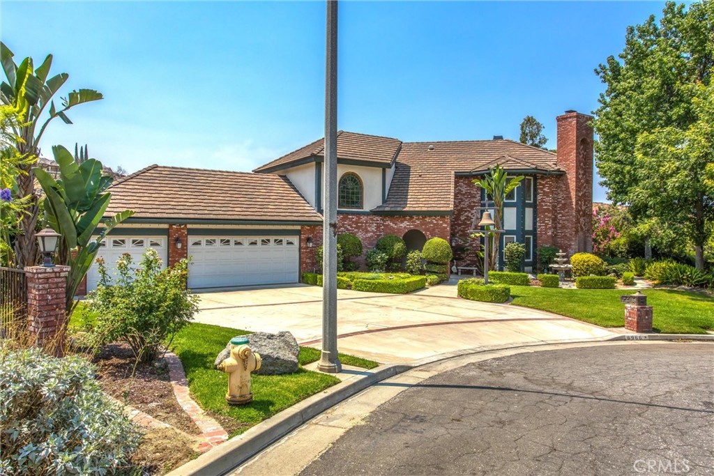 6966 Ranch View Road Riverside, CA 92506 - Photo 2 of 73 a front view of house with yard