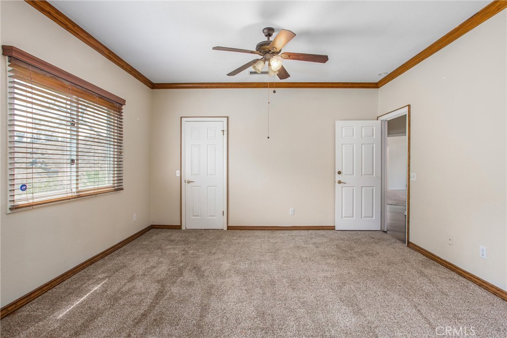 6966 Ranch View Road Riverside, CA 92506 - Photo 23 of 73 a view of an empty room with a window