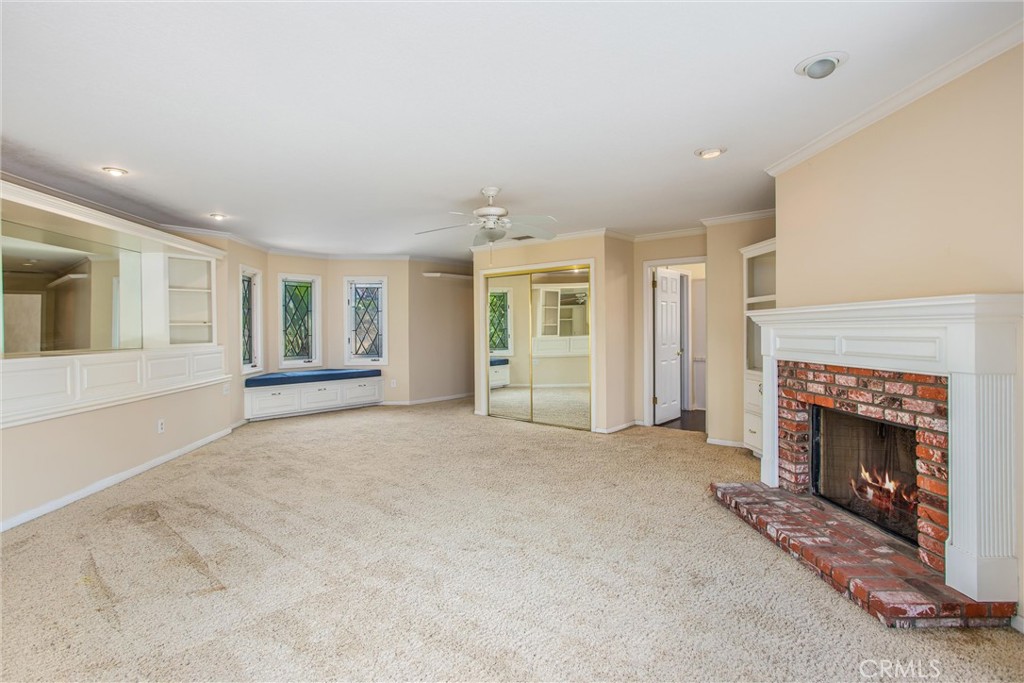6966 Ranch View Road Riverside, CA 92506 - Photo 31 of 73 a view of an empty room with a fireplace