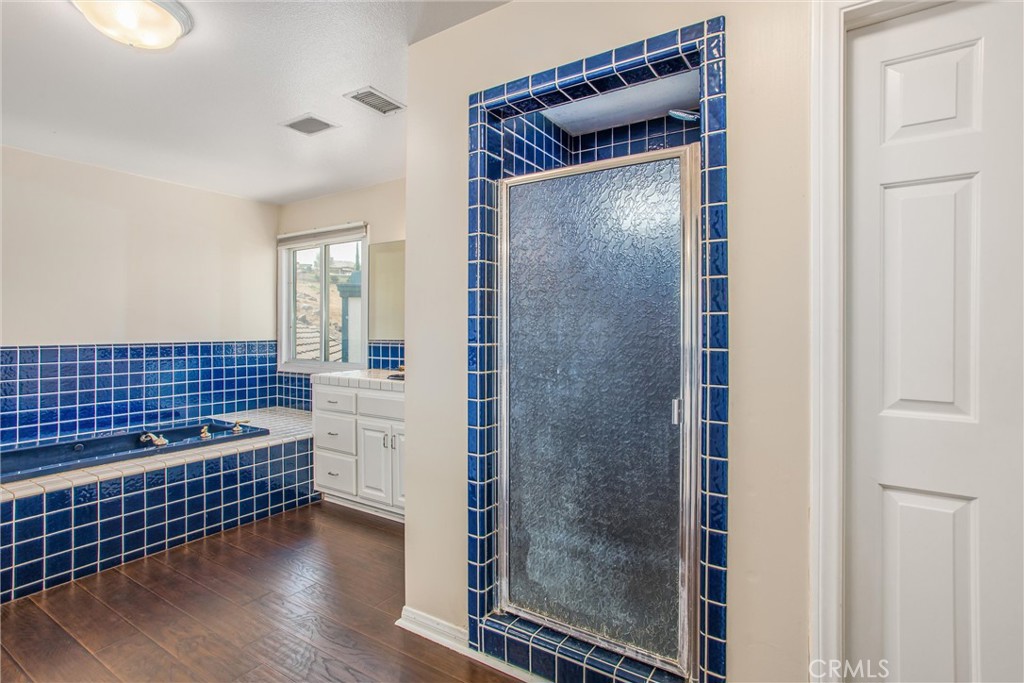 6966 Ranch View Road Riverside, CA 92506 - Photo 33 of 73 a view of empty room with wooden floor