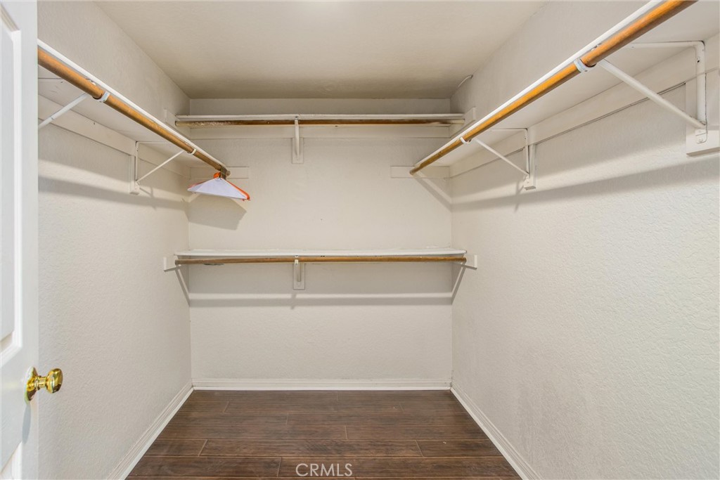 6966 Ranch View Road Riverside, CA 92506 - Photo 58 of 73 a view of an empty walk in closet