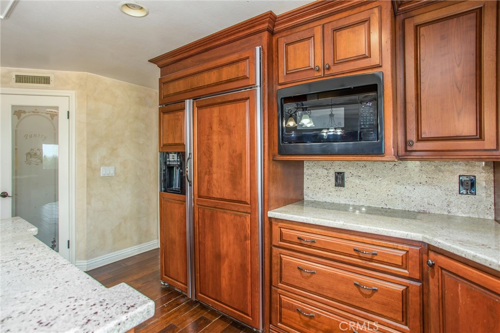 6966 Ranch View Road Riverside, CA 92506 - Photo 10 of 73 a bathroom with a sink and a mirror