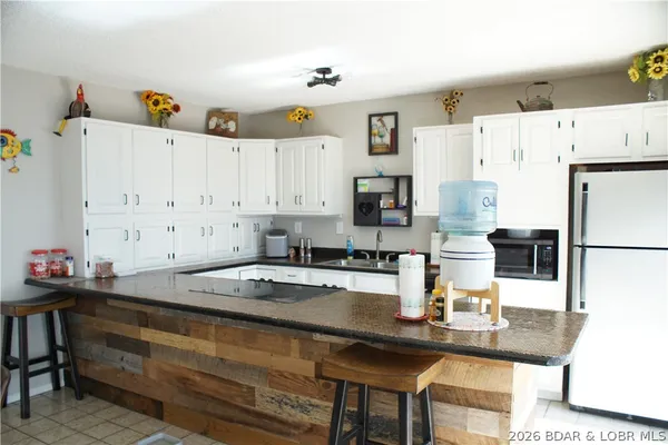 $664,000 | 29744 Clark Road, Gravois Mills, MO 65037