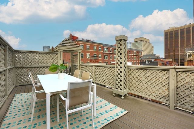 a view of a terrace with seating space