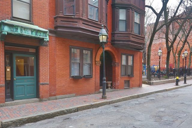 a front view of a building with a pathway