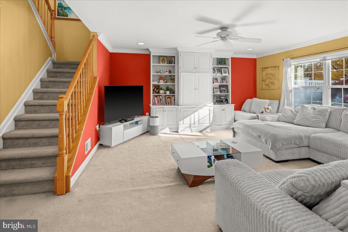 316 Watkins Road Pennington, NJ 08534 - Photo 11 of 37 a living room with furniture and a fireplace