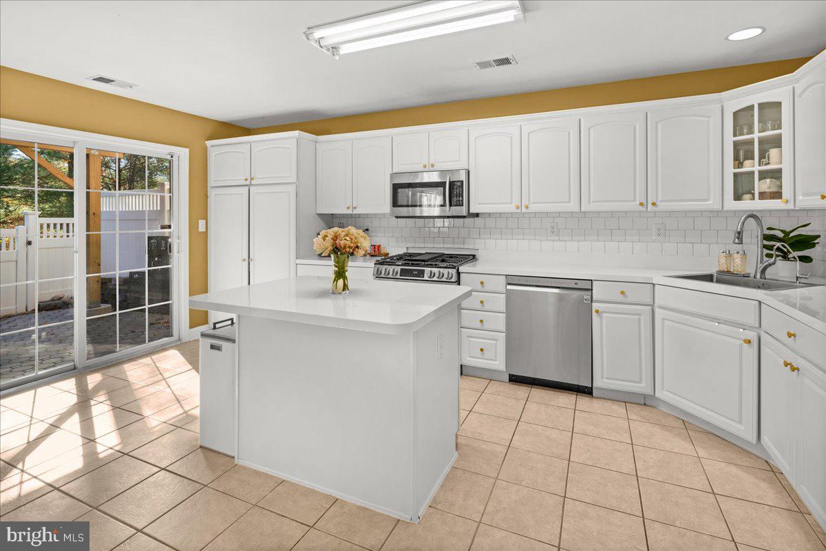 316 Watkins Road Pennington, NJ 08534 - Photo 12 of 37 a kitchen with a sink cabinets and window