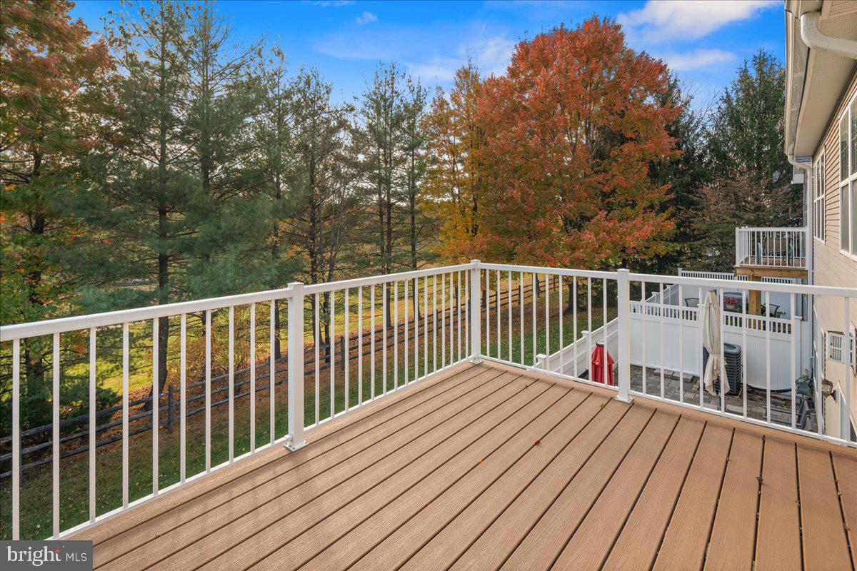 316 Watkins Road Pennington, NJ 08534 - Photo 16 of 37 a view of balcony with wooden floor and fence