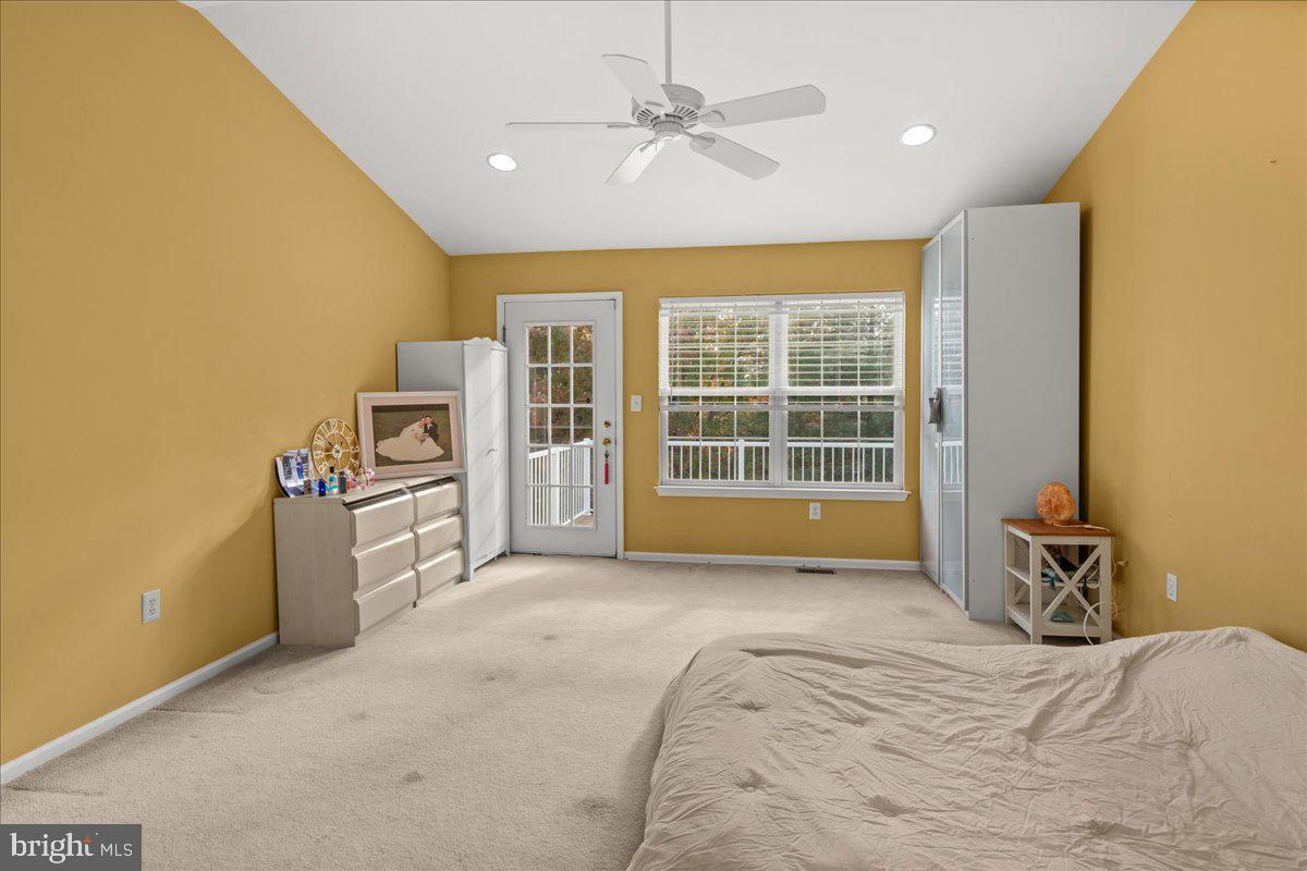316 Watkins Road Pennington, NJ 08534 - Photo 19 of 37 a view of a bedroom with a bed and a large window