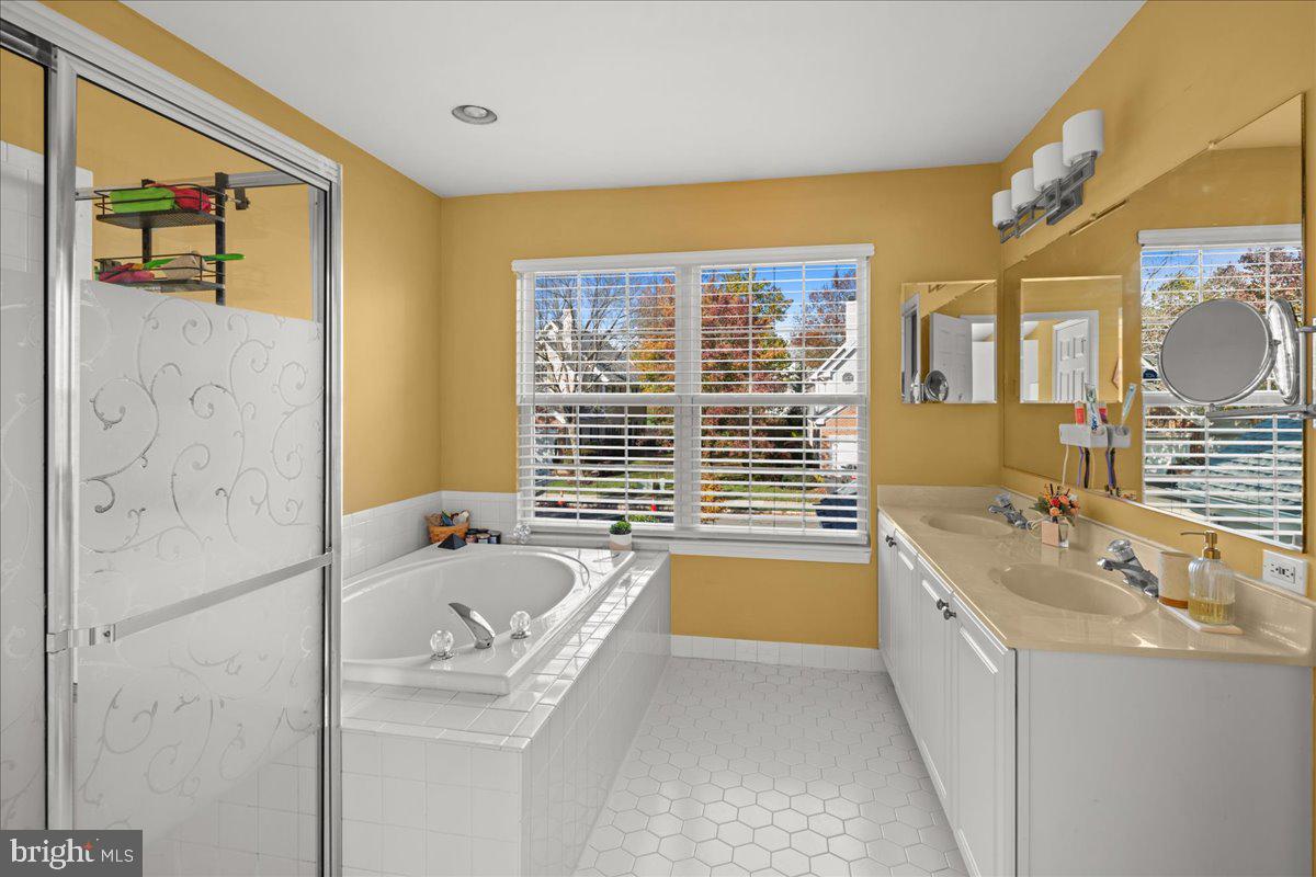 316 Watkins Road Pennington, NJ 08534 - Photo 21 of 37 a bathroom with a tub sink and mirror