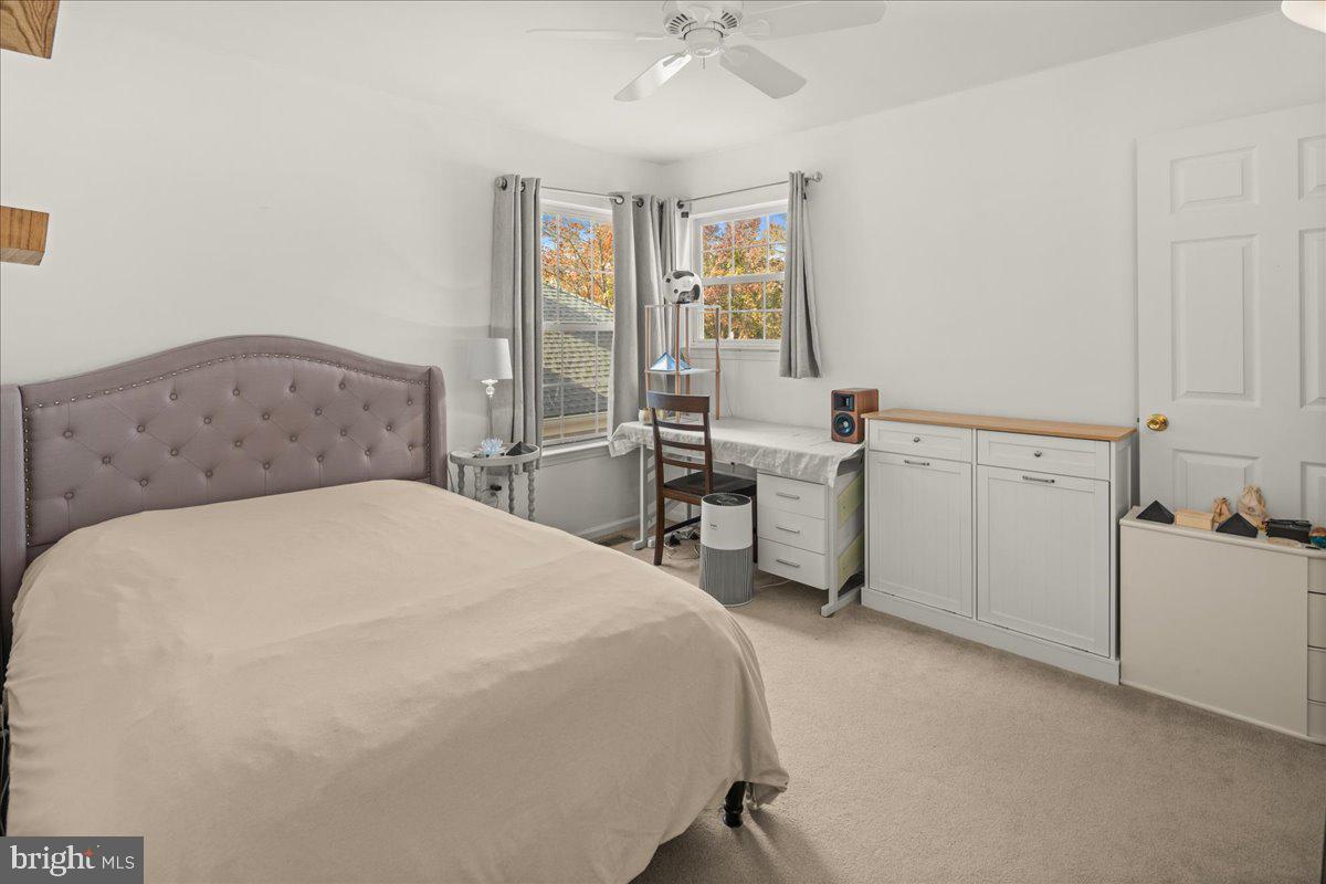 316 Watkins Road Pennington, NJ 08534 - Photo 23 of 37 a bedroom with a bed and a cabinets