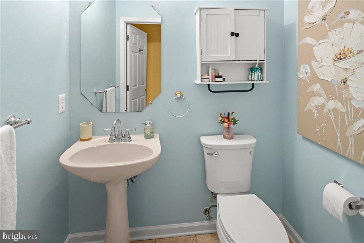 316 Watkins Road Pennington, NJ 08534 - Photo 26 of 37 a bathroom with a sink a toilet and mirror