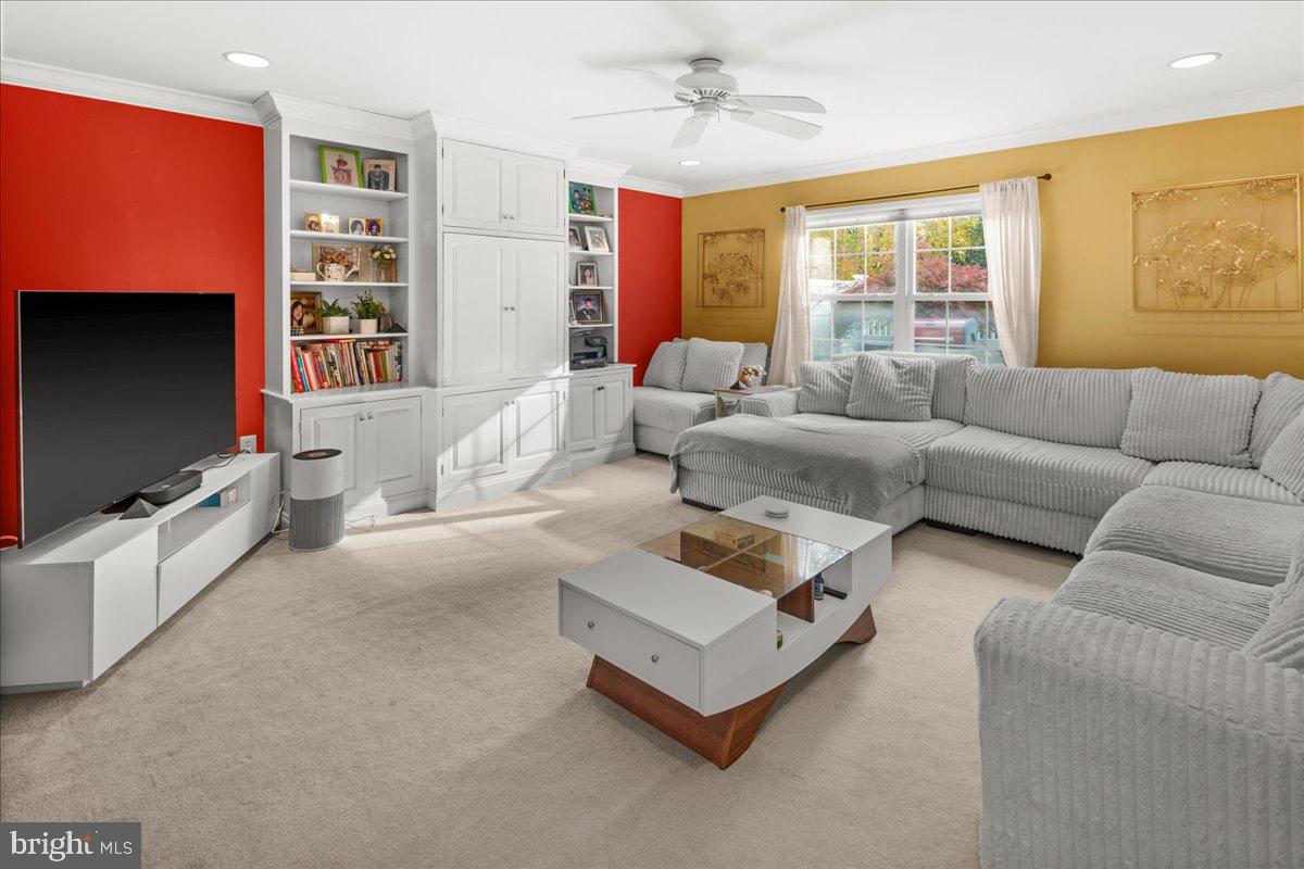 316 Watkins Road Pennington, NJ 08534 - Photo 8 of 37 a living room with furniture and a flat screen tv