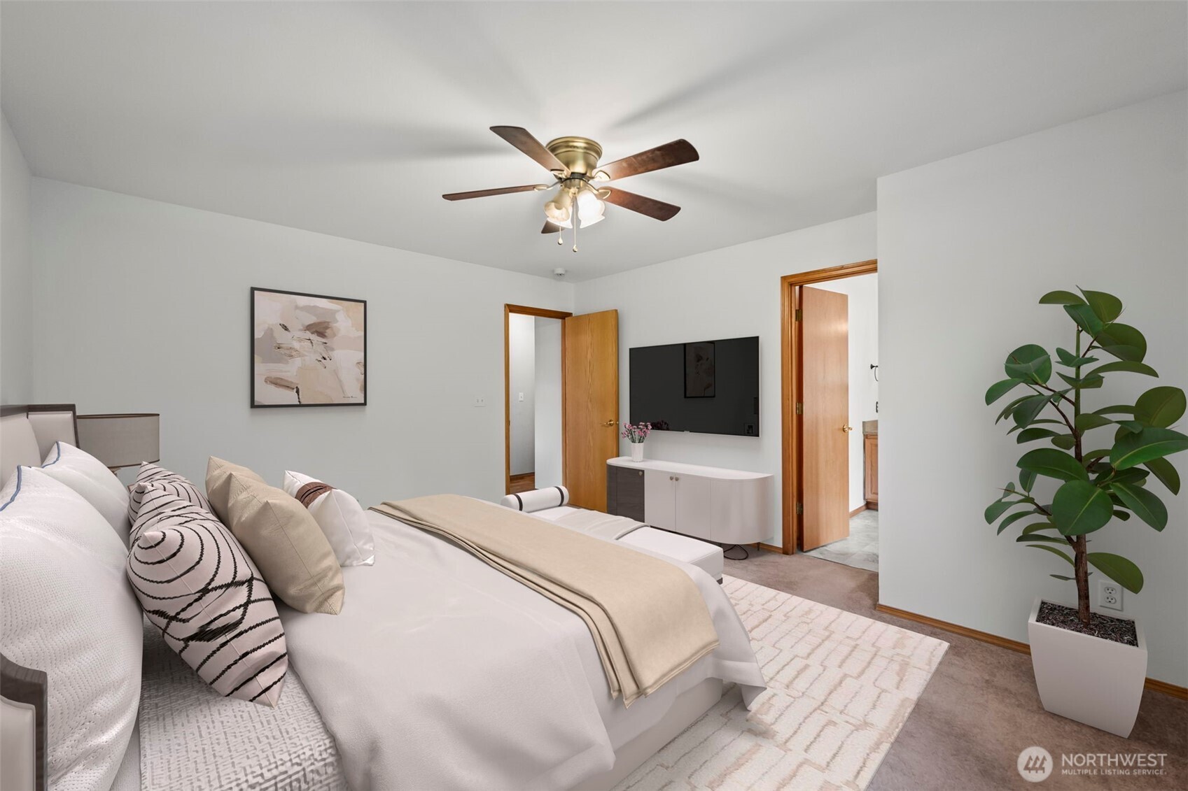 9117 336th Street South Roy, WA 98580 - Photo 13 of 38 a bedroom with a bed and a potted plant