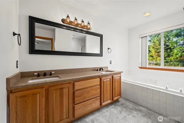 a bathroom with a sink and a bathtub