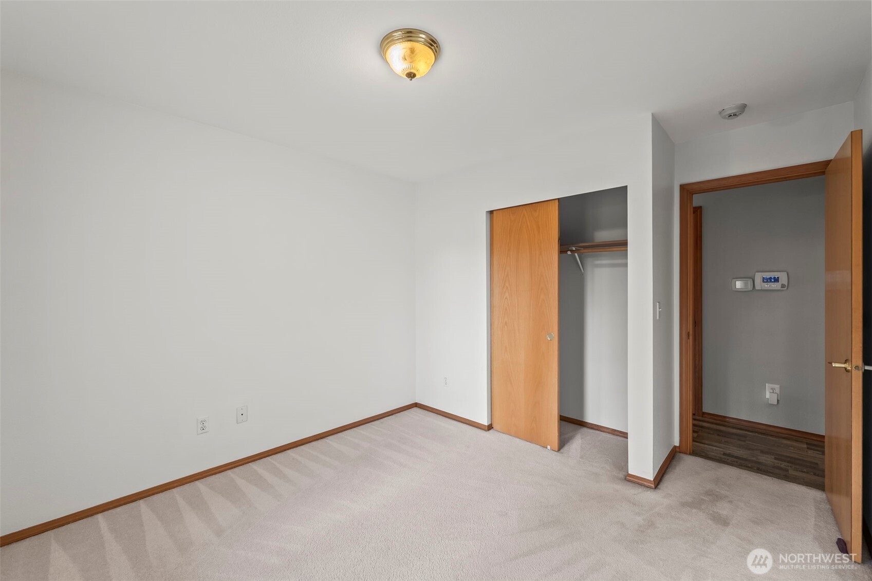 9117 336th Street South Roy, WA 98580 - Photo 20 of 38 an empty room with windows and closet