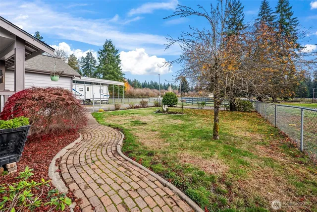 a view of a backyard with a garden