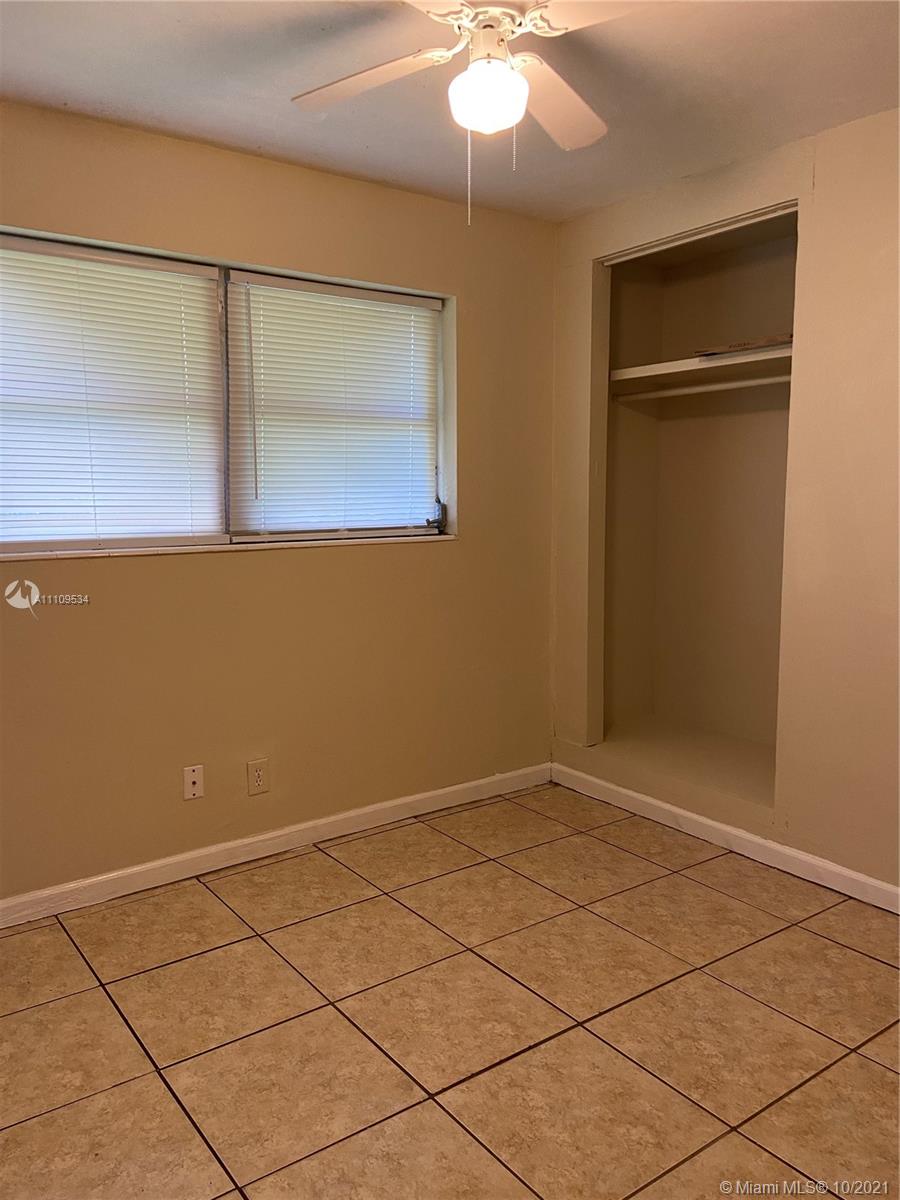 1509 Pine Tree Court Riviera Beach, FL 33404 - Photo 12 of 19 a view of room with window