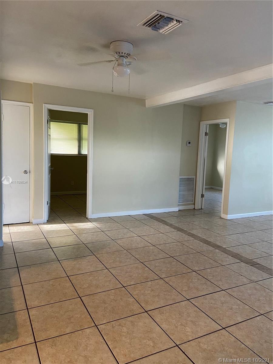 1509 Pine Tree Court Riviera Beach, FL 33404 - Photo 19 of 19 a view of an empty room with a window