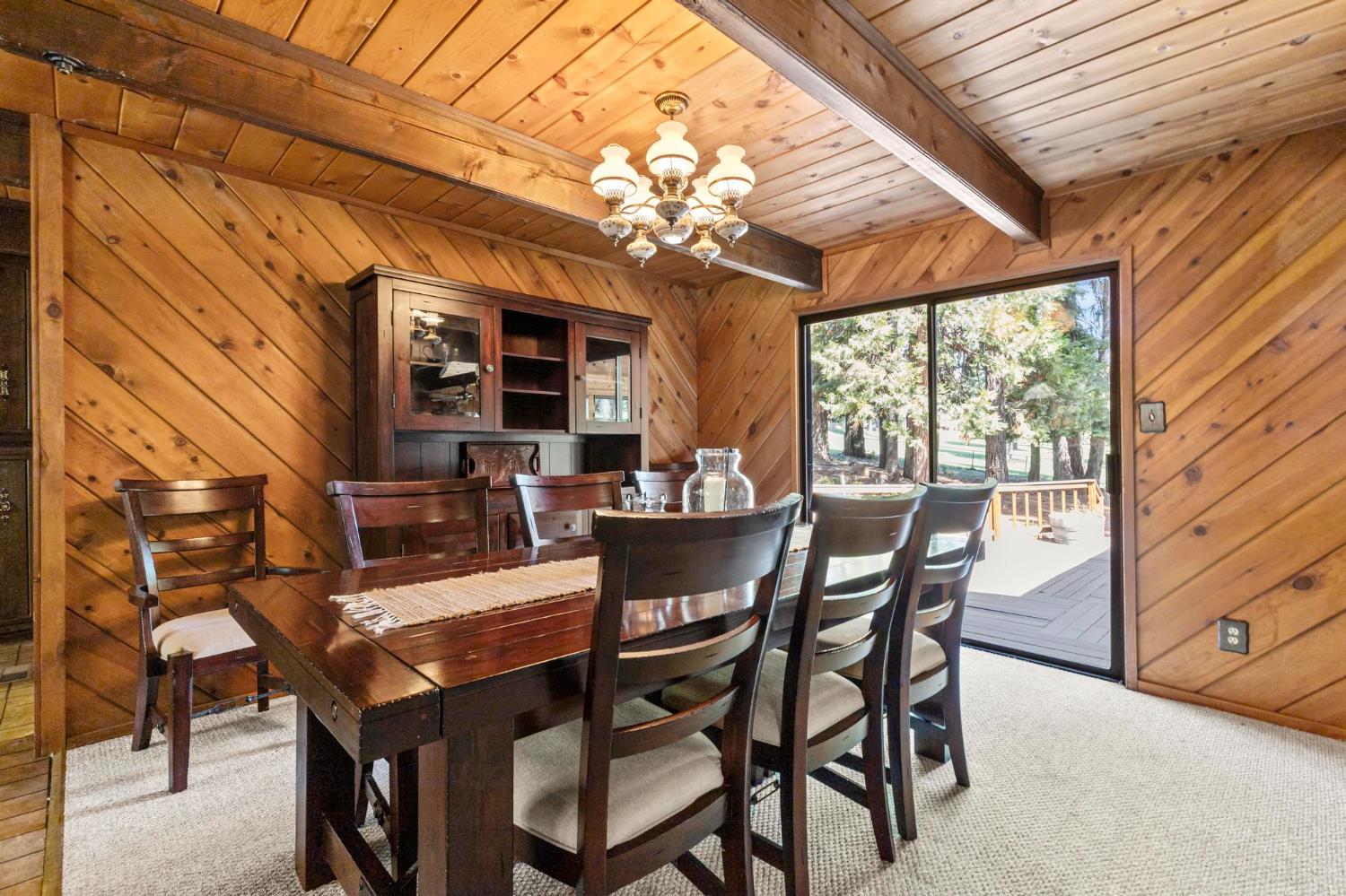 1131 Lake Ridge Road Lake Almanor, CA 96137 - Photo 12 of 55 a dining room with furniture and window