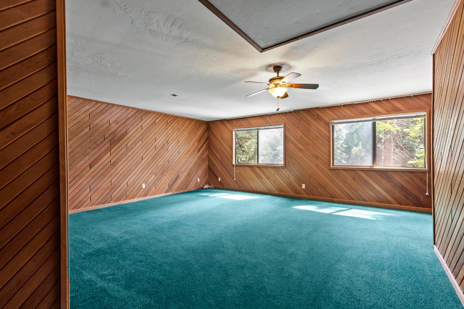 1131 Lake Ridge Road Lake Almanor, CA 96137 - Photo 25 of 55 a view of an empty room with window and wooden floor