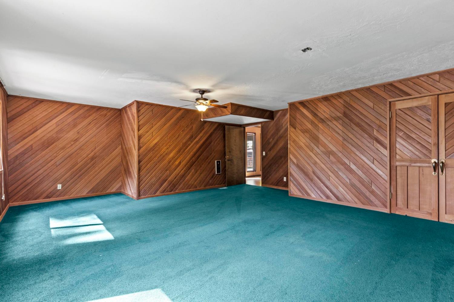1131 Lake Ridge Road Lake Almanor, CA 96137 - Photo 26 of 55 a view of a room with wooden walls