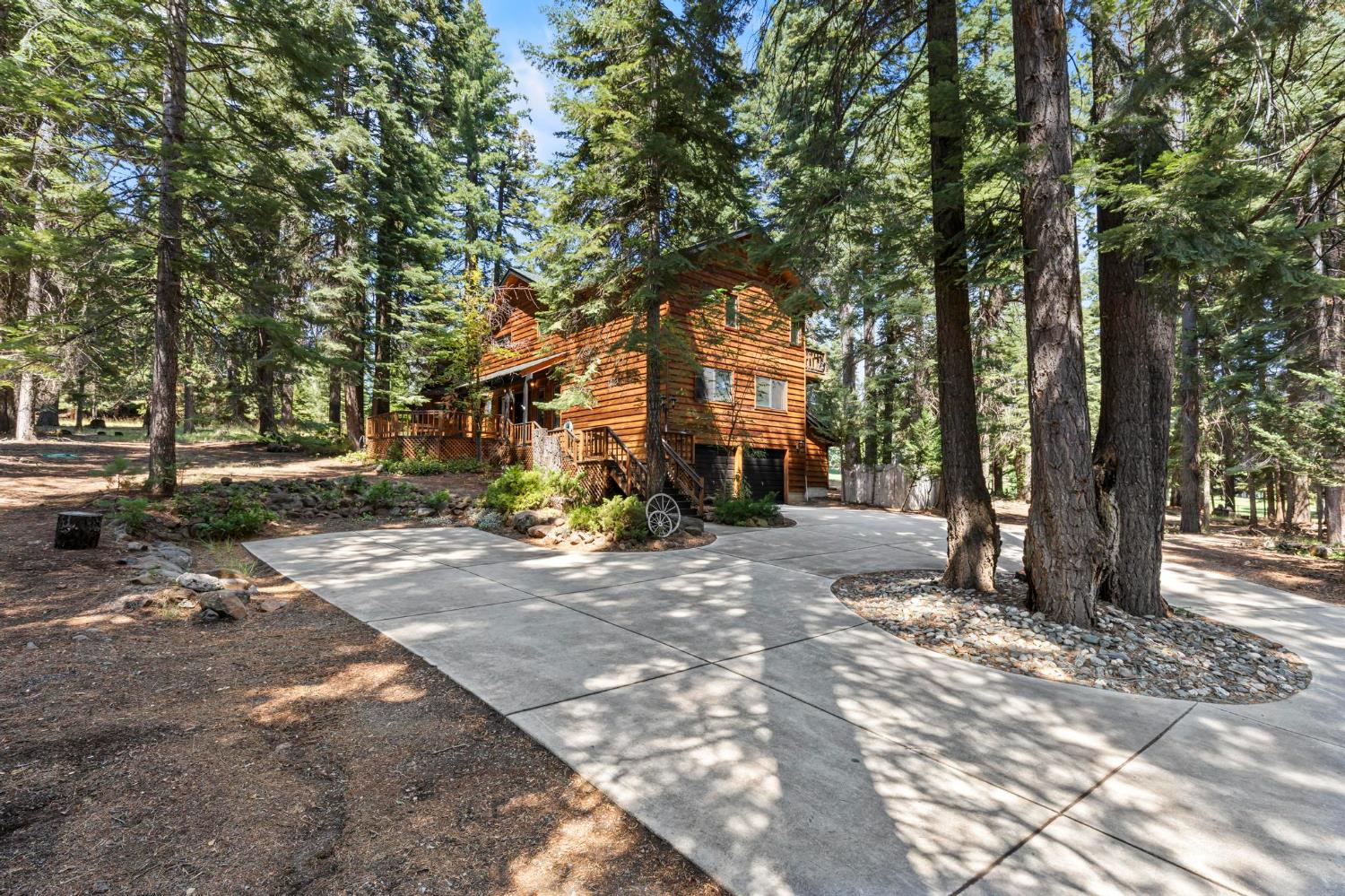 1131 Lake Ridge Road Lake Almanor, CA 96137 - Photo 3 of 55 a view of road with trees