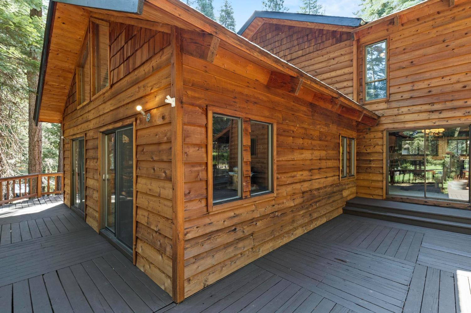 1131 Lake Ridge Road Lake Almanor, CA 96137 - Photo 46 of 55 a view of a two room with wooden walls and stairs