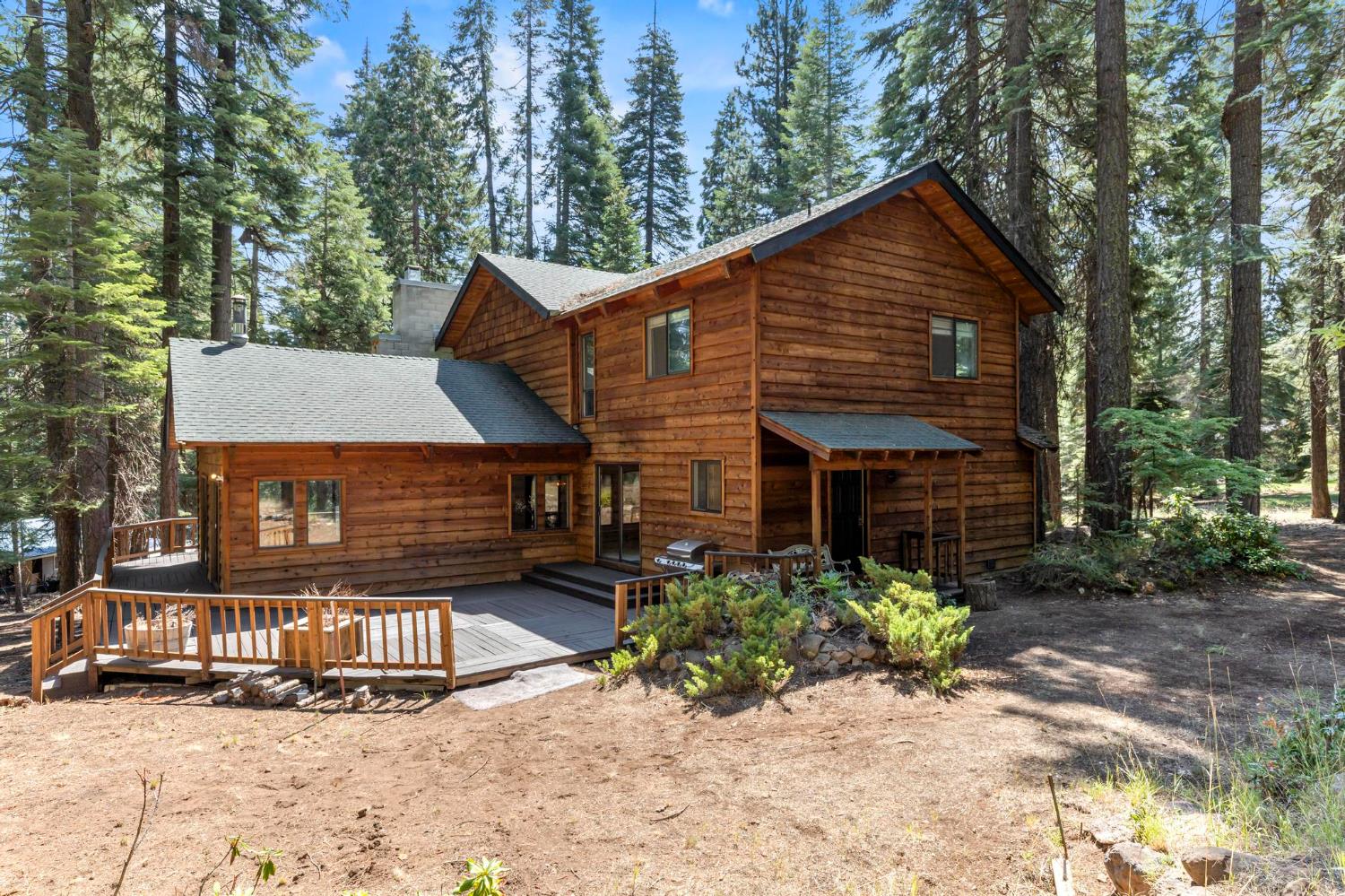 1131 Lake Ridge Road Lake Almanor, CA 96137 - Photo 48 of 55 a view of a house with a small yard