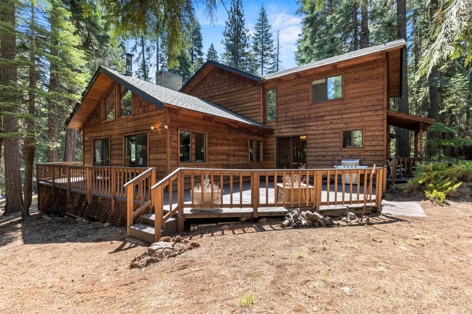 1131 Lake Ridge Road Lake Almanor, CA 96137 - Photo 49 of 55 front view of a house with a yard