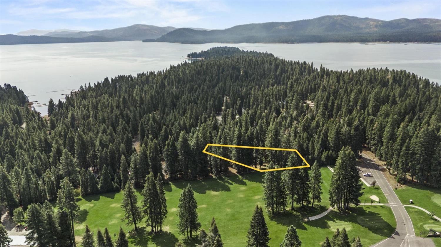 1131 Lake Ridge Road Lake Almanor, CA 96137 - Photo 52 of 55 a view of a lake and a mountain view