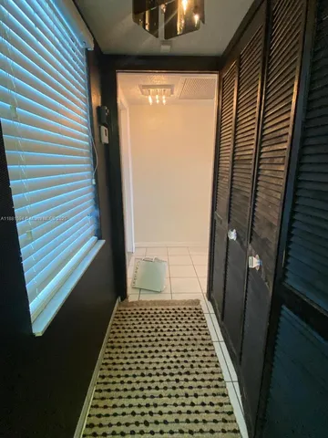 a view of a swimming pool with a yard