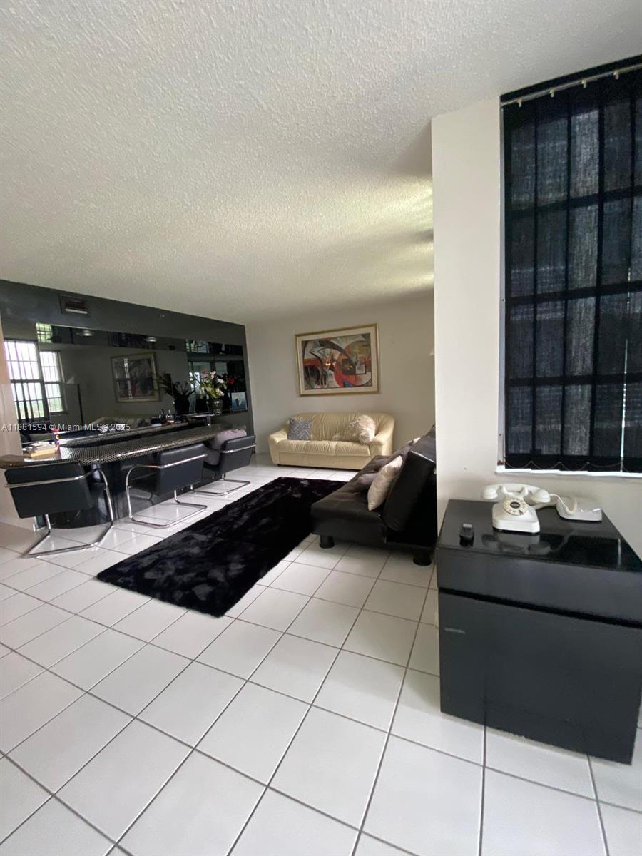 3507 Oaks Way, Unit 804 Pompano Beach, FL 33069 - Photo 20 of 26 a kitchen with a sink and cabinets