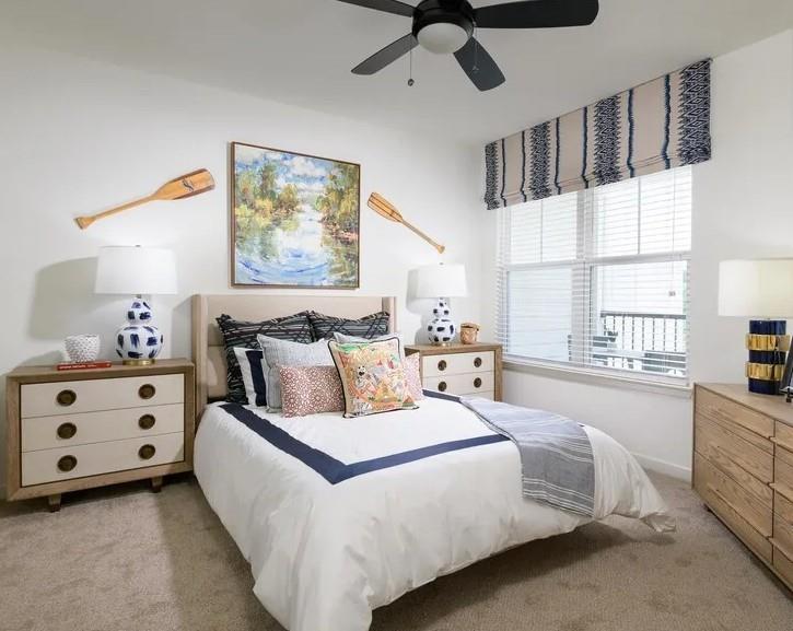 6255 Riverview Road Southeast, Unit 2417 Mableton, GA 30126 - Photo 3 of 16 a spacious bedroom with a bed a window and dresser