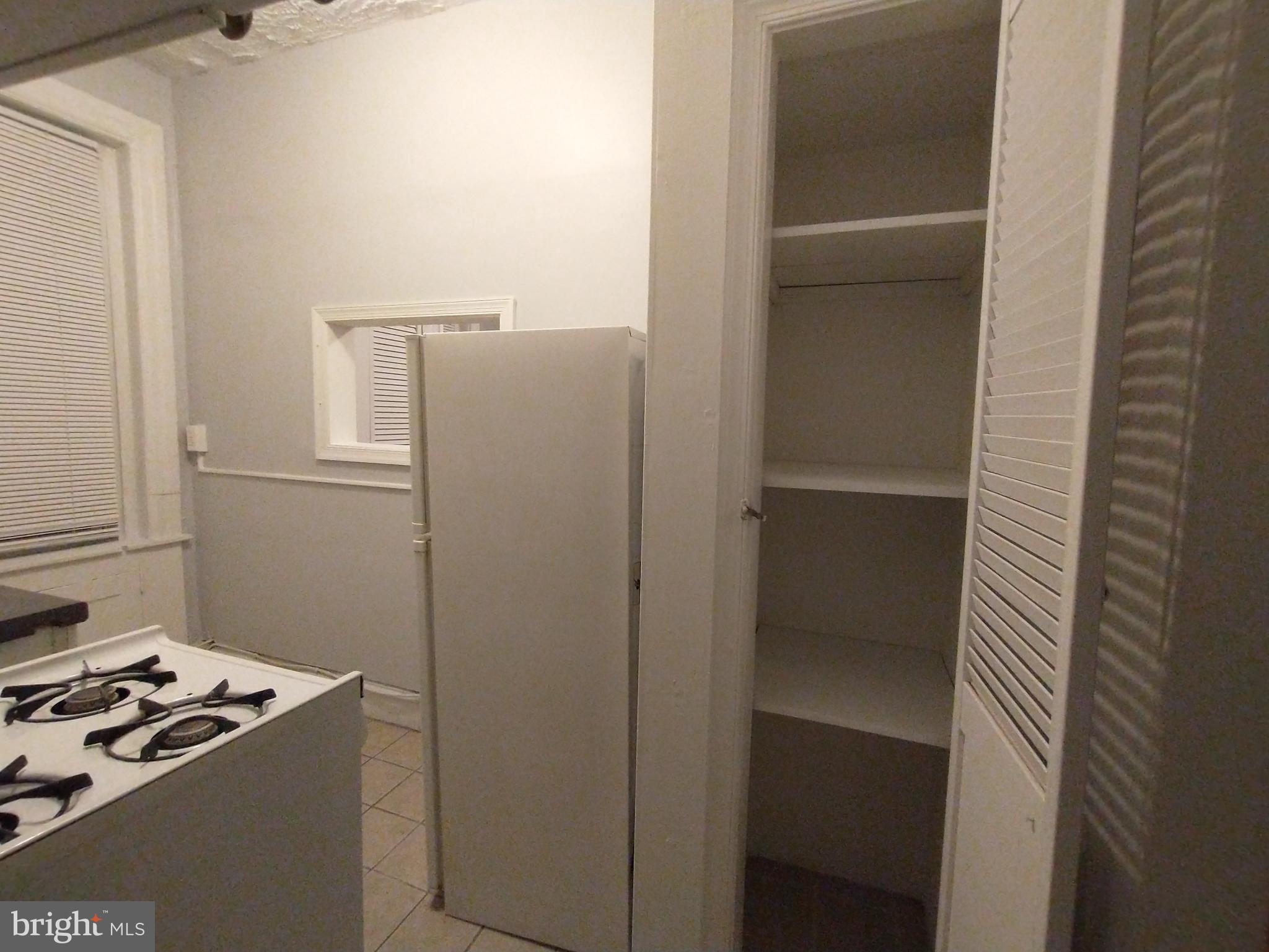 307 Dolphin Street, Unit 3C Baltimore, MD 21201 - Photo 8 of 14 a view of kitchen