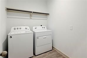 206 John House Lane Rosharon, TX 77583 - Photo 11 of 15 a utility room with dryer and washer