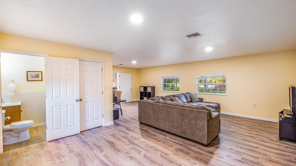 4211 Mustang Road Melbourne, FL 32934 - Photo 18 of 61 048_living_room_view_i