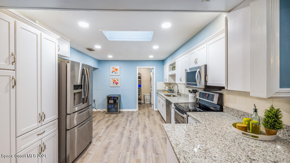 4211 Mustang Road Melbourne, FL 32934 - Photo 22 of 61 044_kitchen_view_ii